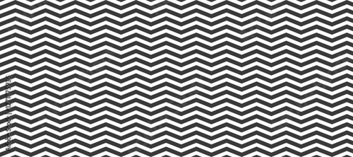 Regular black and white zigzag chevron pattern with seamless zigzag line texture. Abstract geometric background for textiles, wallpapers, and modern designs.
