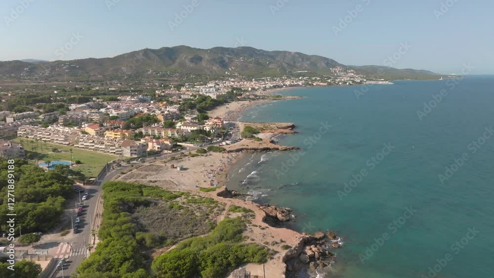 typical Spanish holiday resort on the Mediterranean with beach and cliffs. Aerial view typical Spanish holiday resort on the Mediterranean with beach and cliffs. Aerial view