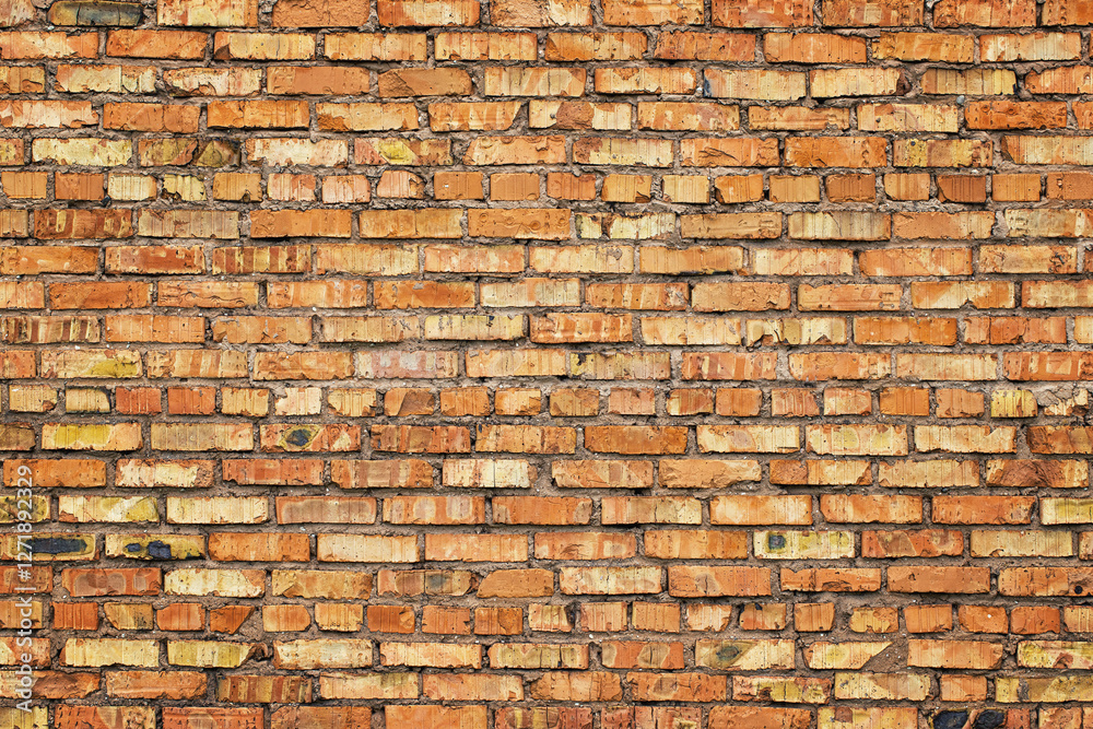 Fototapeta premium abstract background of red stone blocks, rustic brick wall