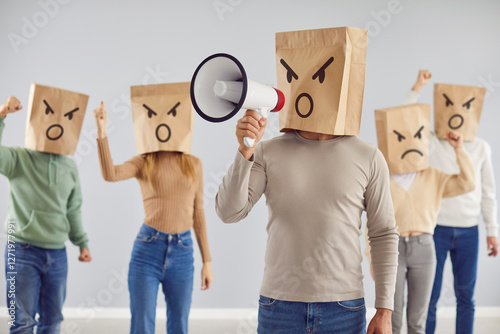 Angry protesting crowd. Disappointed frustrated dissatisfied anonymous adult people with megaphone amplifier with faces hidden in paper shopping bags demanding protection of customer rights