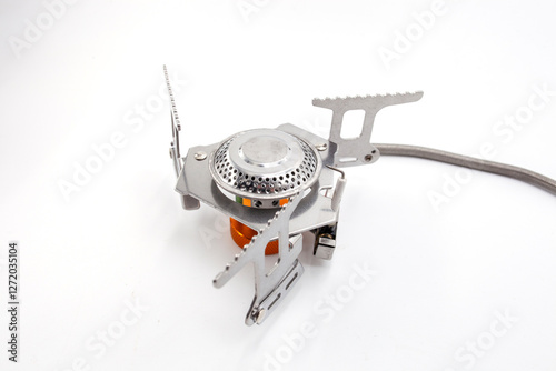 Wallpaper Mural Gas burner, gas crisis. Camping burner. Set fire to a gas stove with a match. Small camping stove burning on top of a kitchen counter, providing heat during a power outage  Torontodigital.ca