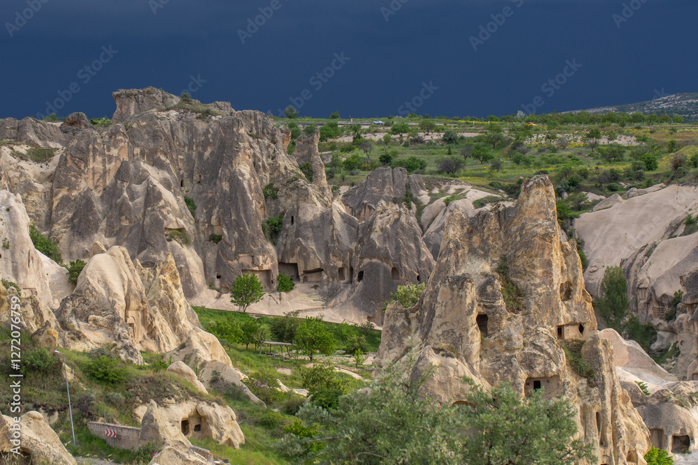 Breathtaking Landscape of Cappadocia with Unique Rock Formations and Ancient Cave Dwellings. A stunning view of the unique rock formations and ancient cave dwellings in Cappadocia, Turkey. Breathtaking Landscape of Cappadocia with Unique Rock Formations and Ancient Cave Dwellings. A stunning view of the unique rock formations and ancient cave dwellings in Cappadocia, Turkey.