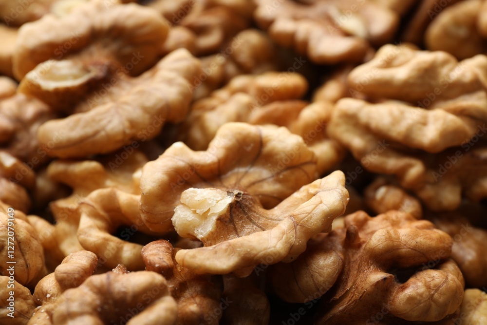 Pile of fresh ripe walnuts as background, closeup Pile of fresh ripe walnuts as background, closeup