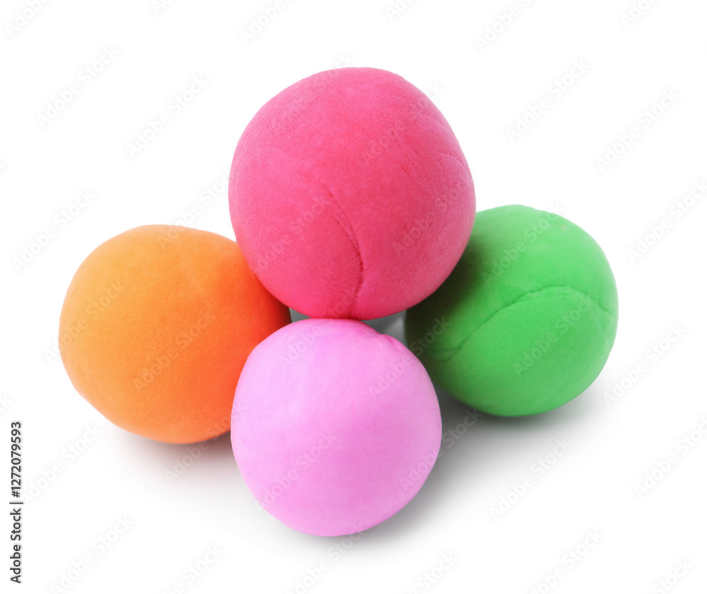 Different colorful play dough balls isolated on white Different colorful play dough balls isolated on white
