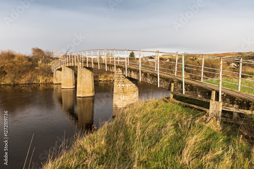 Thropton Footbridge in Northumberland, UK with copy space