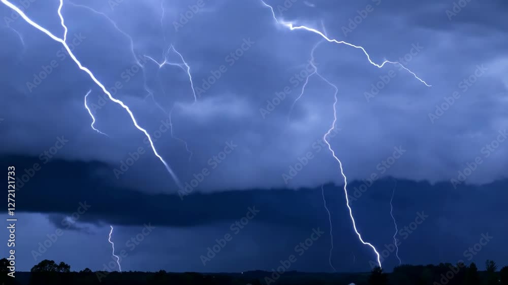 Powerful lightning strikes during a storm create an astonishing display across the darkening sky, casting eerie light over the surrounding landscape as thunder rumbles in the distance.