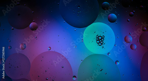 Abstract high-definition image of iridescent oil slick patterns on water, shifting colors between blues, purples, and greens