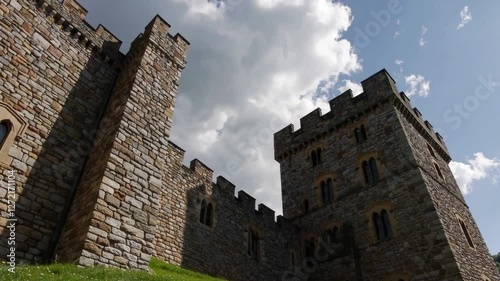 Castle structure standing majestically against bright blue sky