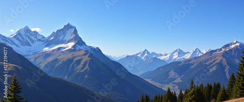 Wallpaper Mural Majestic snow-capped mountains under a clear blue sky surrounded by lush green valleys conveying a sense of tranquility and natural beauty Torontodigital.ca
