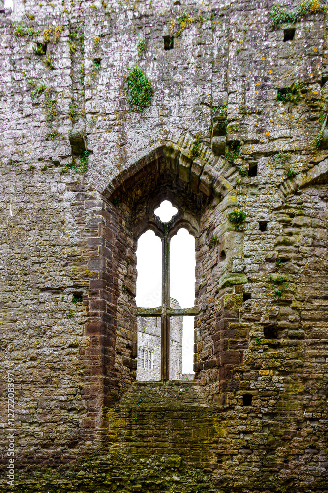 Window in an old ruined castle. Chepstow castle of Wales. Window in an old ruined castle. Chepstow castle of Wales.