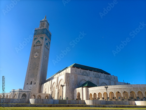 Hassan ii mosque standing tall against clear blue sky in casablanca