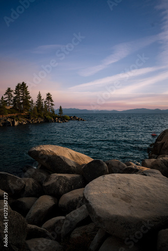 trees and rocks sunset over Lake Tahoe