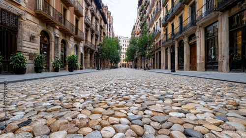 Cobblestone street in old European city center, low angle view. Possible use Stock photo for travel photo