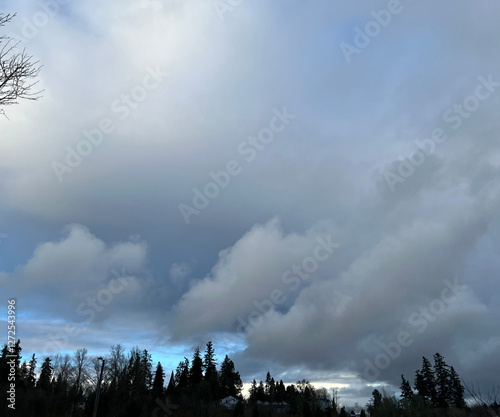 blue sky with clouds and rainbow