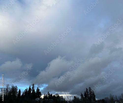 blue sky with clouds and rainbow