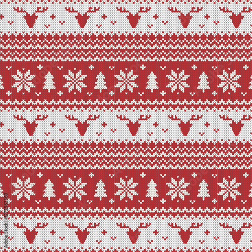 Holiday fair isle traditional knit christmas seamless pattern. Winter holiday sweater design with reindeer snowflakes. 