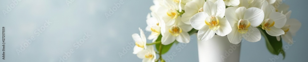 Tall white vase, cascading white hydrangeas and orchids , cascade, table decor Tall white vase, cascading white hydrangeas and orchids , cascade, table decor