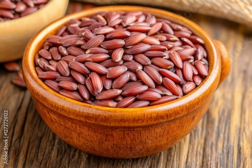 A close-up of brown rice grains in a bowl, highlighting a healthy carb option