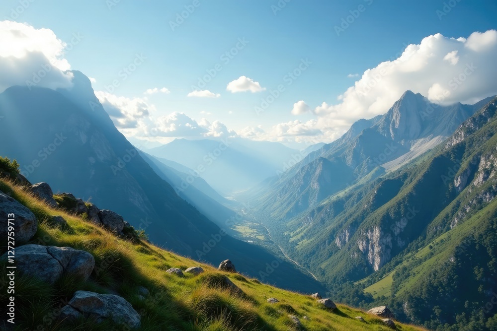 Clouds drifting slowly above a valley with rugged peaks, scenery, expansive, serenity Clouds drifting slowly above a valley with rugged peaks, scenery, expansive, serenity
