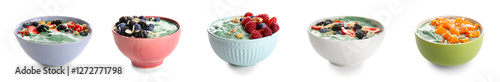 Set of tasty spirulina yogurt with fruits and berries on white background photo