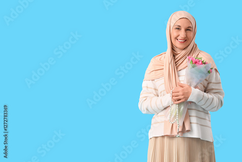 Mature Muslim woman with tu...