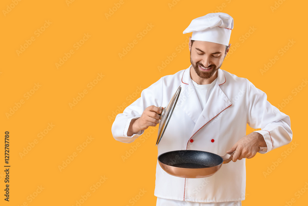 Handsome bearded chef with frying pan on yellow background Handsome bearded chef with frying pan on yellow background