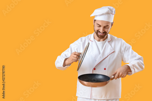 Handsome bearded chef with ...