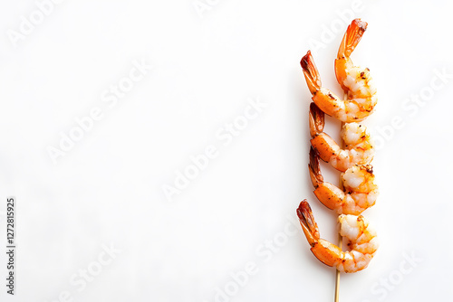 Delicious grilled or baked shrimp stick skewer Juicy yellow-brown on white background. Food family gatherings, holiday feasts, gourmet dinners. Perfectly cooked, juicy, and flavorful. Copy space.	