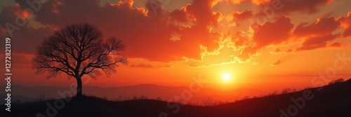 A breathtaking sunset over rolling hills, featuring a solitary tree silhouetted against vibrant clouds. Perfect for nature, travel, and lifestyle themes.