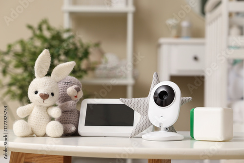 Baby monitor with toys on t...