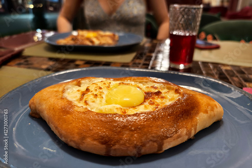 Traditional Georgian bread - khachapuri madjarski with cooker hand. Homemade baking. overhead.Khachapuri with cheese , georgian khachapuri megruli with cheese, Traditional Georgian pie cooking process