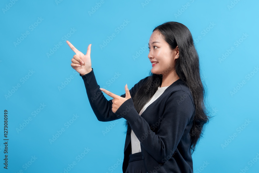 Happy woman pointing with both hands to the side against blue background. Confident gesture presenting an idea, perfect for business, advertising, and promotional designs. Happy woman pointing with both hands to the side against blue background. Confident gesture presenting an idea, perfect for business, advertising, and promotional designs.