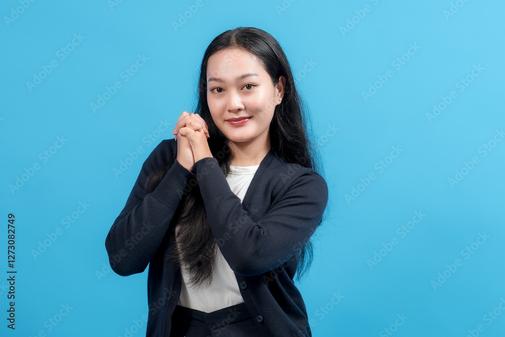 Cheerful woman in casual outfit smiling against vibrant blue background, showing friendly and confident expression. Ideal for themes like positivity, communication, and happiness. Cheerful woman in casual outfit smiling against vibrant blue background, showing friendly and confident expression. Ideal for themes like positivity, communication, and happiness.