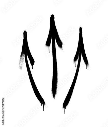 Graffiti arrows with overspray in black over white.