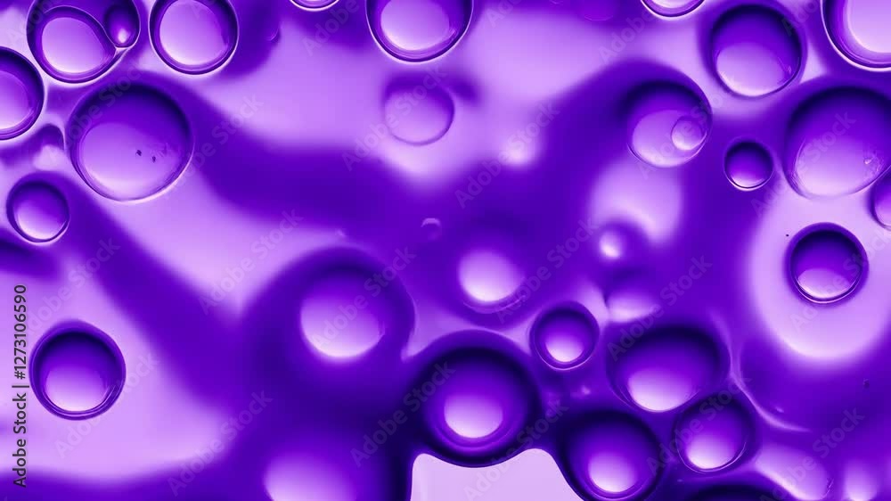 Abstract VDO of Purple Liquid Bubbles Creating Smooth, Fluid Texture with Vibrant Color and Organic Shapes Evoking Calm and Creativity, Featuring Dynamic Pattern of Purple Bubbles and Fluid Shapes