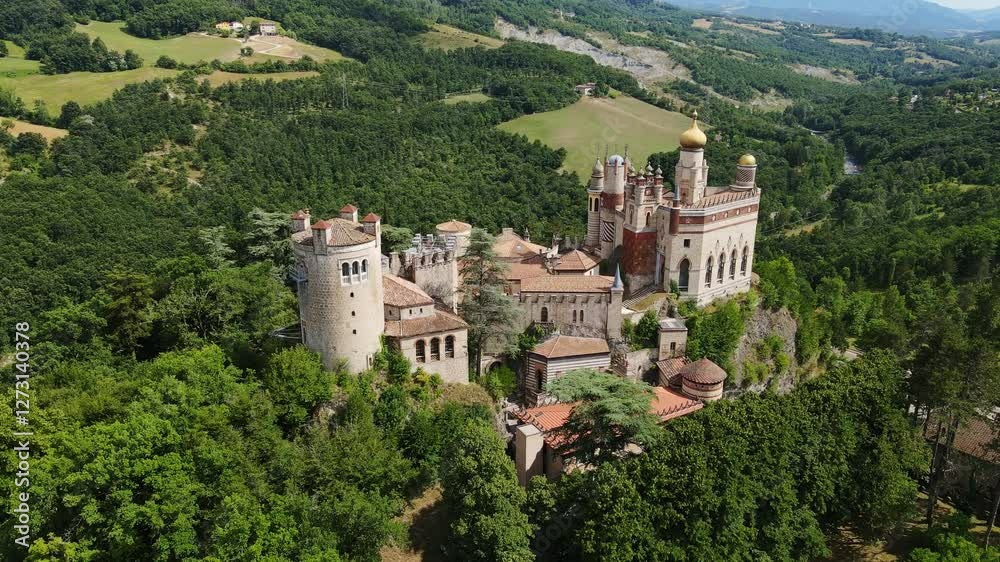 Drone backward, revealing unique architecture of Rocchetta Mattei in Apennines Drone backward, revealing unique architecture of Rocchetta Mattei in Apennines