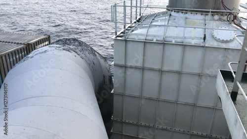The exhaust gas scrubber system on board a ship