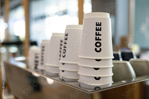 Wallpaper Mural A row of coffee cups with the word coffee on them Torontodigital.ca