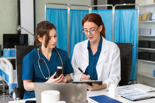 Diversity, medical team head leaders discuss results, brainstorming and planning. photo