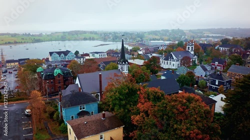 Aerial drone shot over the local town of Lunenburg in Nova Scotia, Canada. Fishing lobster town. Foggy misty day.