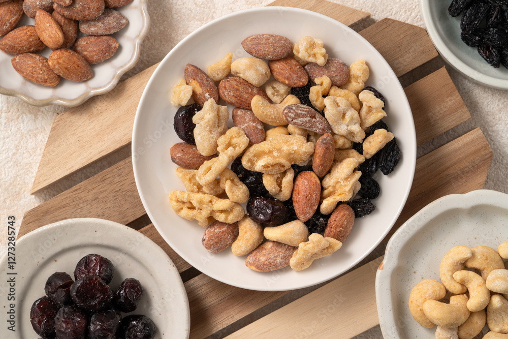 Flavored mixed nuts in bowls. Flavored mixed nuts in bowls.