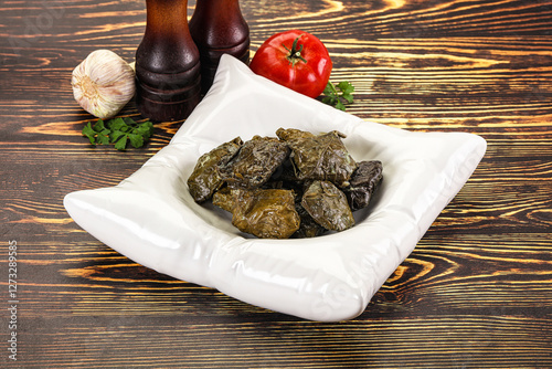 Stuffed dolma - meat in grape leaves photo