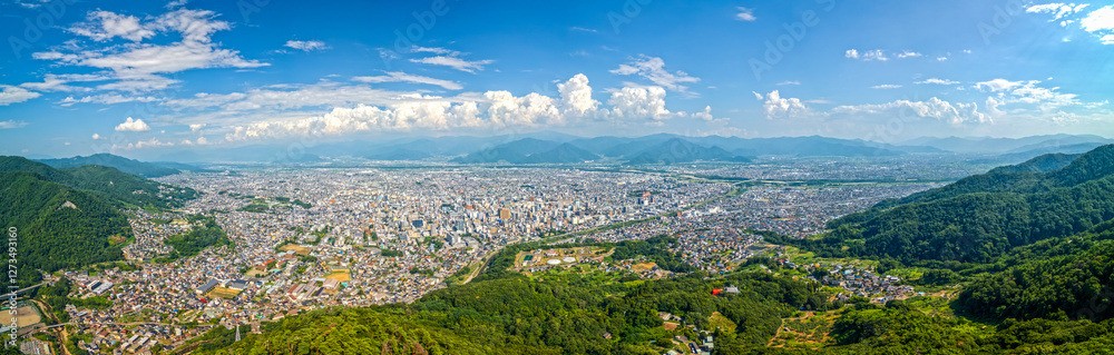 Nagano City, Japan with cityscape panorama at dusk from Asahi Mountain Nagano City, Japan with cityscape panorama at dusk from Asahi Mountain