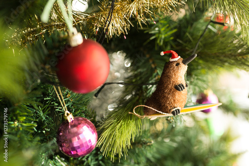 Platypus Christmas decoration hanging on a tree