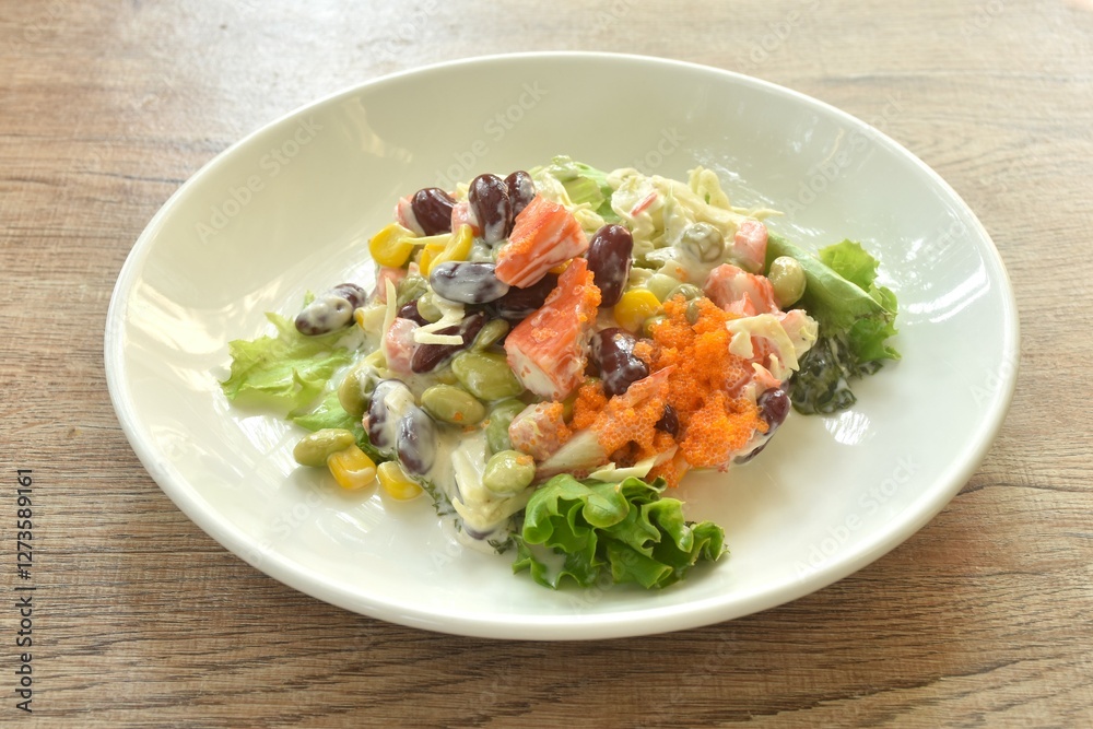 crab stick and vegetable topping shrimp egg salad on plate crab stick and vegetable topping shrimp egg salad on plate