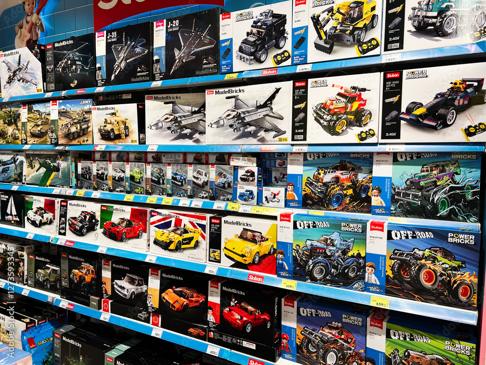 Obraz premium Lviv, Ukraine - February 16, 2025: Various toy construction kits arranged on display shelves in a toy store