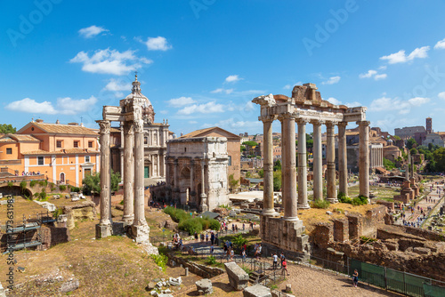 Top view of the Roman Forum with ruins of ancient Roman monuments on a sunny summer day, Rome, Italy