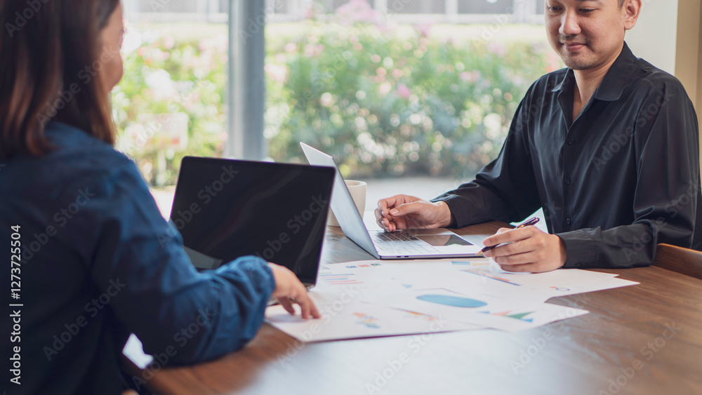 business collaboration, financial analysis, and teamwork, professionals reviewing financial reports and discussing data. The workspace, charts, and strategic documents, a corporate and analytical