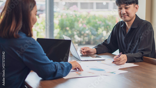 Obraz na płótnie business collaboration, financial analysis, and teamwork, professionals reviewing financial reports and discussing data. The workspace, charts, and strategic documents, a corporate and analytical w salonie
