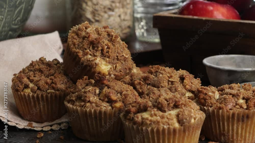 Baking apple crumb muffins for breakfast. Using ingredients like eggs, flour, red apples, sugar, vanilla, baking powder, brown sugar and cinnamon. Baking apple crumb muffins for breakfast. Using ingredients like eggs, flour, red apples, sugar, vanilla, baking powder, brown sugar and cinnamon.
